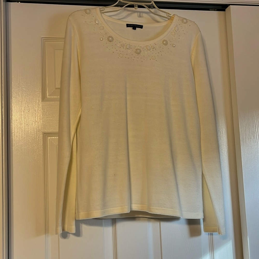 Size L cream colored pullover sweater with beautiful neckline embellishment